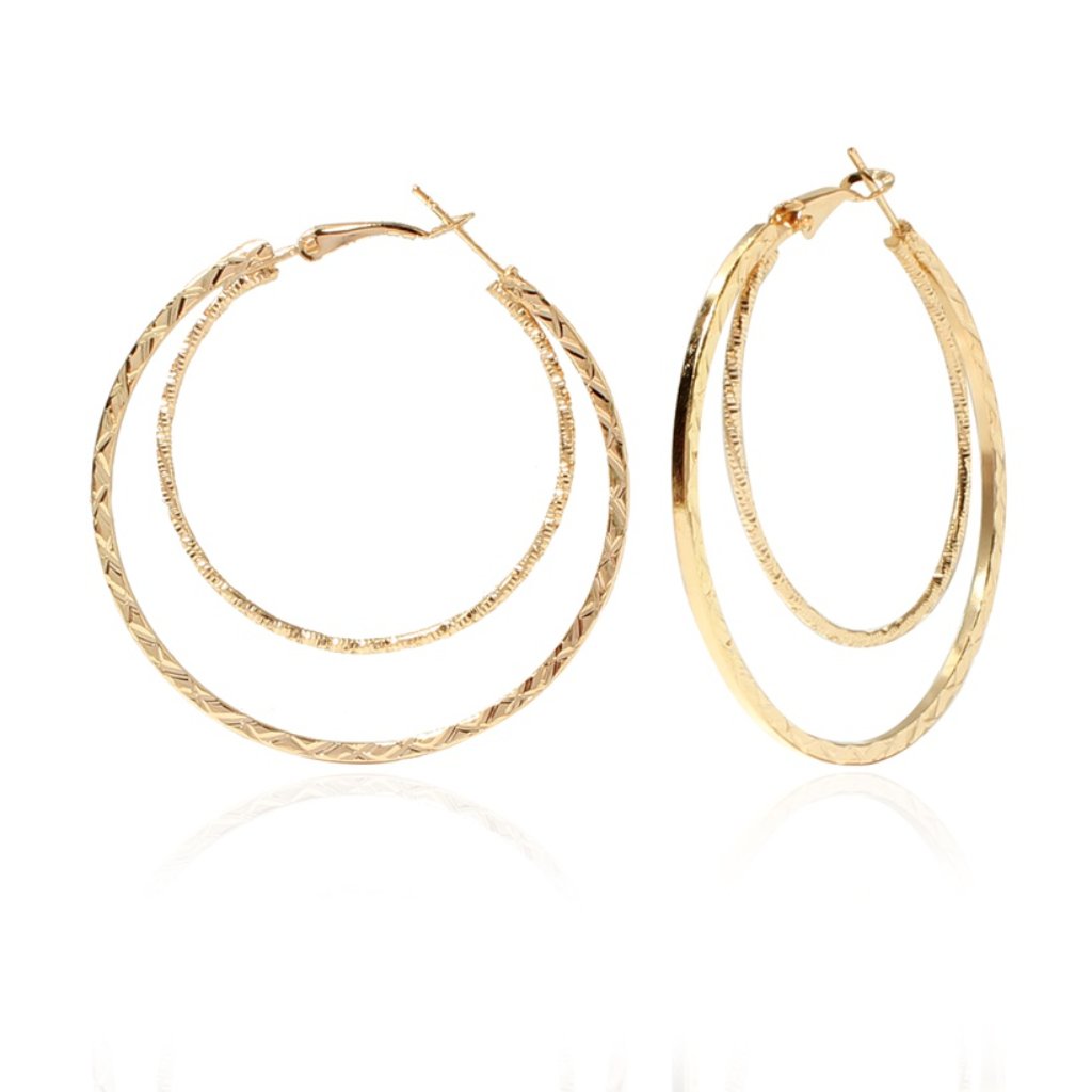 Gold hoop earrings photographed for a marketplace product listing